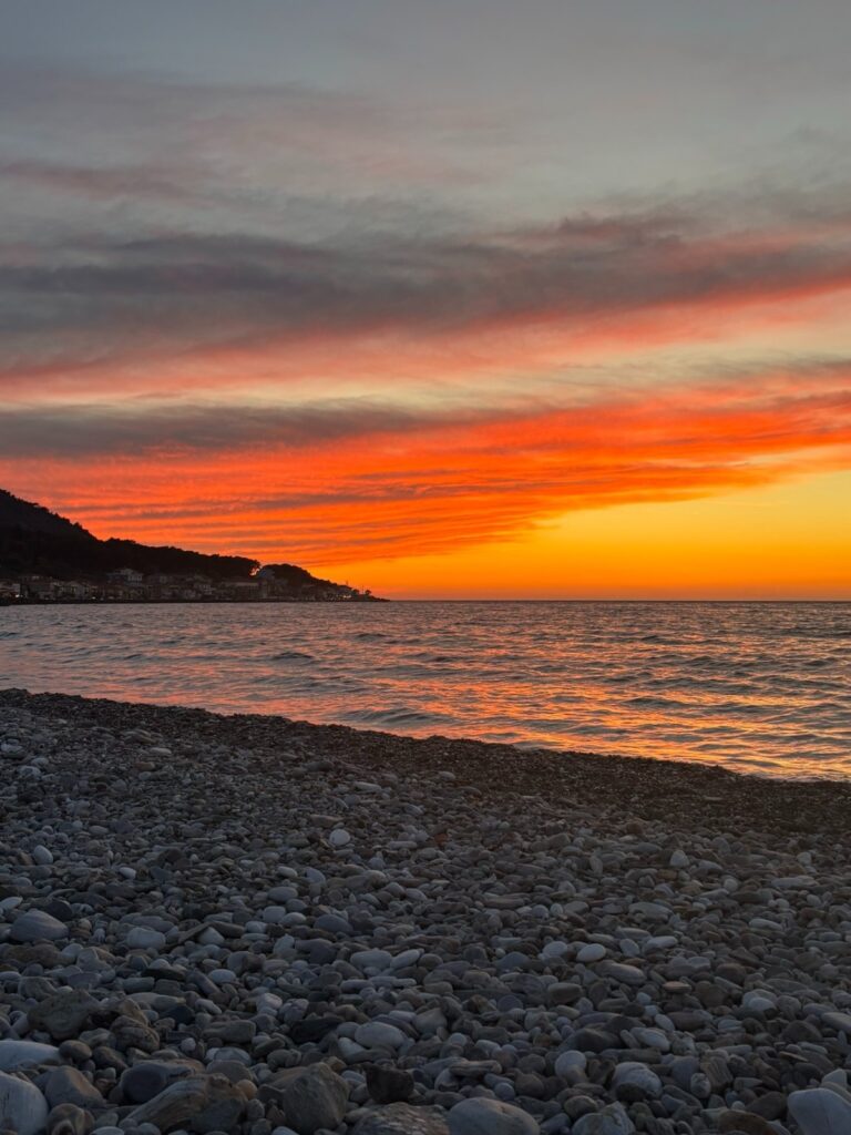 sun gowing down at potami beach samos