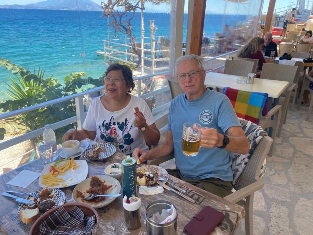 At pappa beach samos having a break with beer and food during ebike tour route 1 on samos